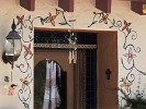 Wall around door, 3910 East La Creciente